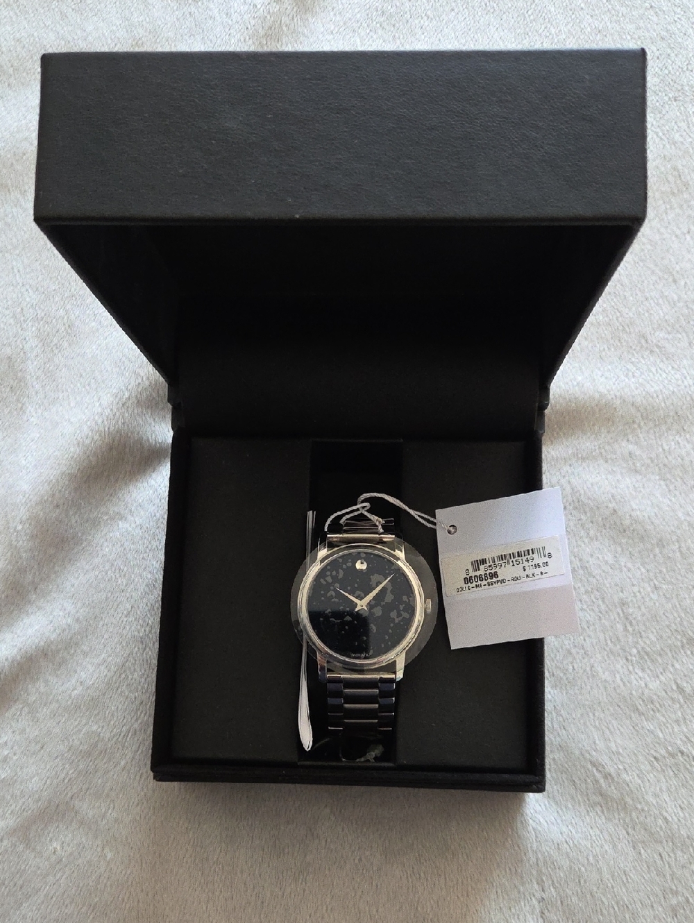 BNIB Men's Movado Watch. Silver With Black Face.